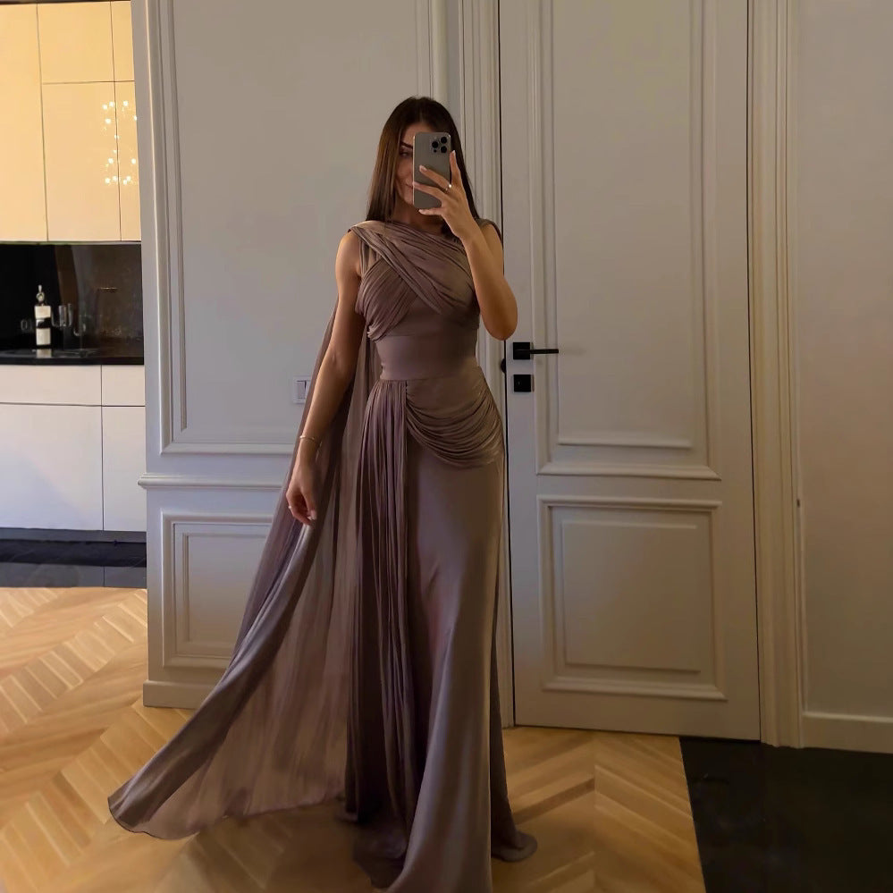 Elegant greyish purple sleeveless long dress with ribbon detail. Mid-waist fit, made from polyester, perfect for casual or formal occasions.