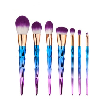 7-piece professional makeup brush set with soft nylon bristles, electroplated rubber handle, and aluminum tube. Perfect for foundation, blush, eyeshadow, concealer, and blending.