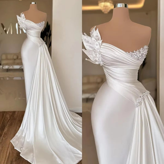 Elegant white sleeveless dress with a tight waist, perfect for company annual meetings. Made from polyester fiber. Available in sizes 2–26W.