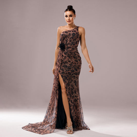Chic leopard print hip skirt dress with sequined details and collage stitching. Made from polyester, perfect for elegant occasions. Sizes S–XL.
