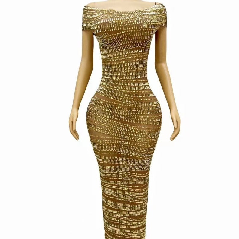 Chic gold hip skirt dress in spandex with hot-drilled rhinestone details. Short sleeves, mid-waist fit, and long length. Perfect for street-style and casual events.