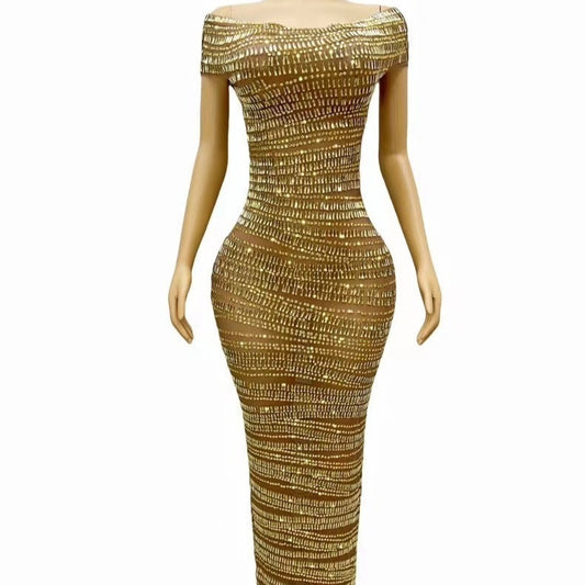 Chic gold hip skirt dress in spandex with hot-drilled rhinestone details. Short sleeves, mid-waist fit, and long length. Perfect for street-style and casual events.