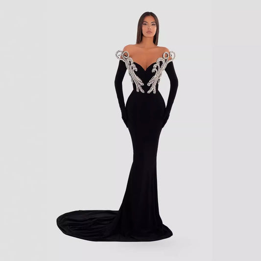 Sophisticated black sleeveless long dress with character print, mid waist fit, and elegant tight skirt design. Perfect for chic office wear, evening events, or stylish outings.