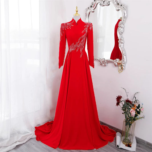 Elegant red retro-style dress with beaded detailing and long sleeves. Perfect for women who love classic fashion with an artistic touch. Available in sizes S–XXL.