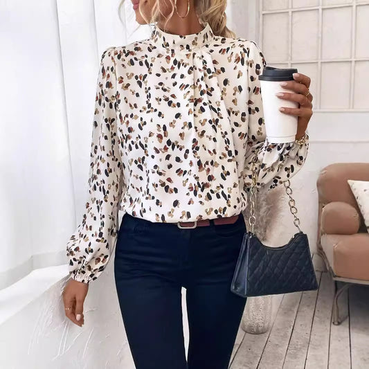 Shop the Women’s White Lantern Sleeve Blouse. Elegant long sleeve polyester top perfect for office, casual, or evening wear. Available in sizes S–XXL.