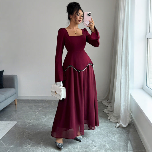 Elegant purplish red bell sleeve dress with long sleeves and mid waist fit. Perfect for both casual and dressy occasions. Sizes S–XL. Lightweight polyester.
